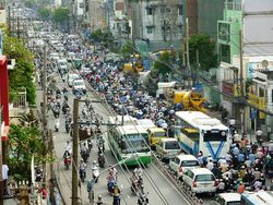 Photograph of people riding motorbikes in Ho Chi Minh City